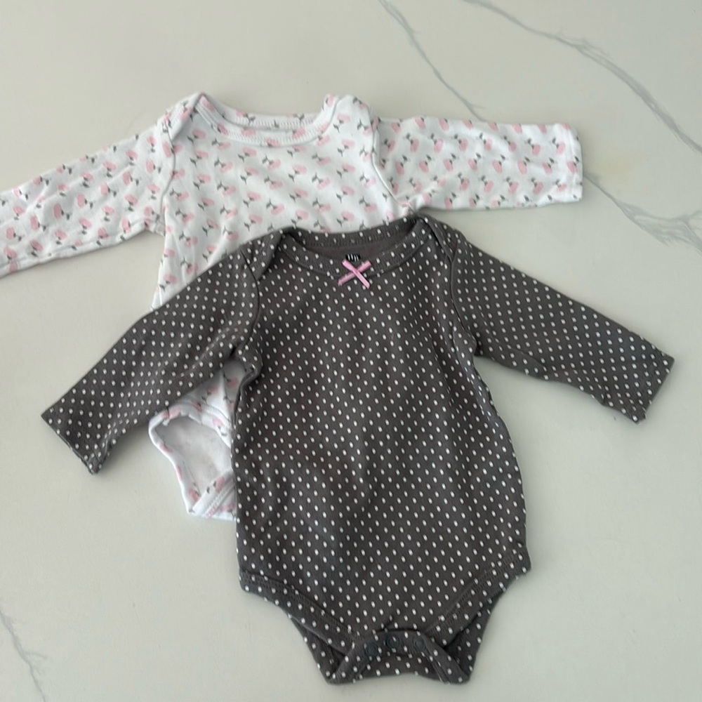 Size 0-3 gently used onesies